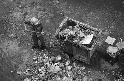 Commercial waste removal team in action